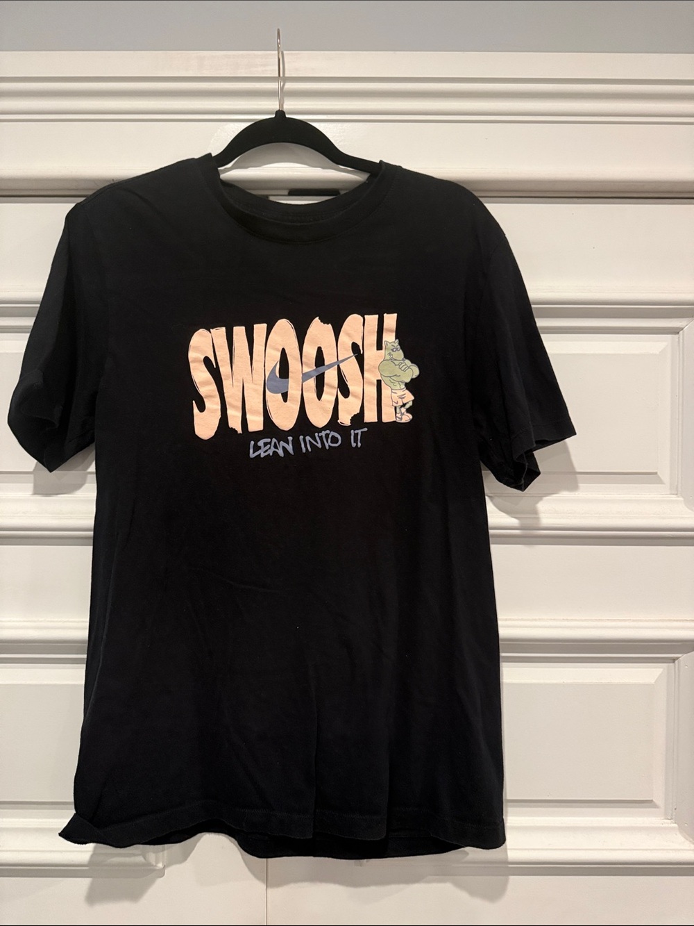 Nike Black Short-Sleeve 'Swoosh' Graphic Tee with Peach and Green Print